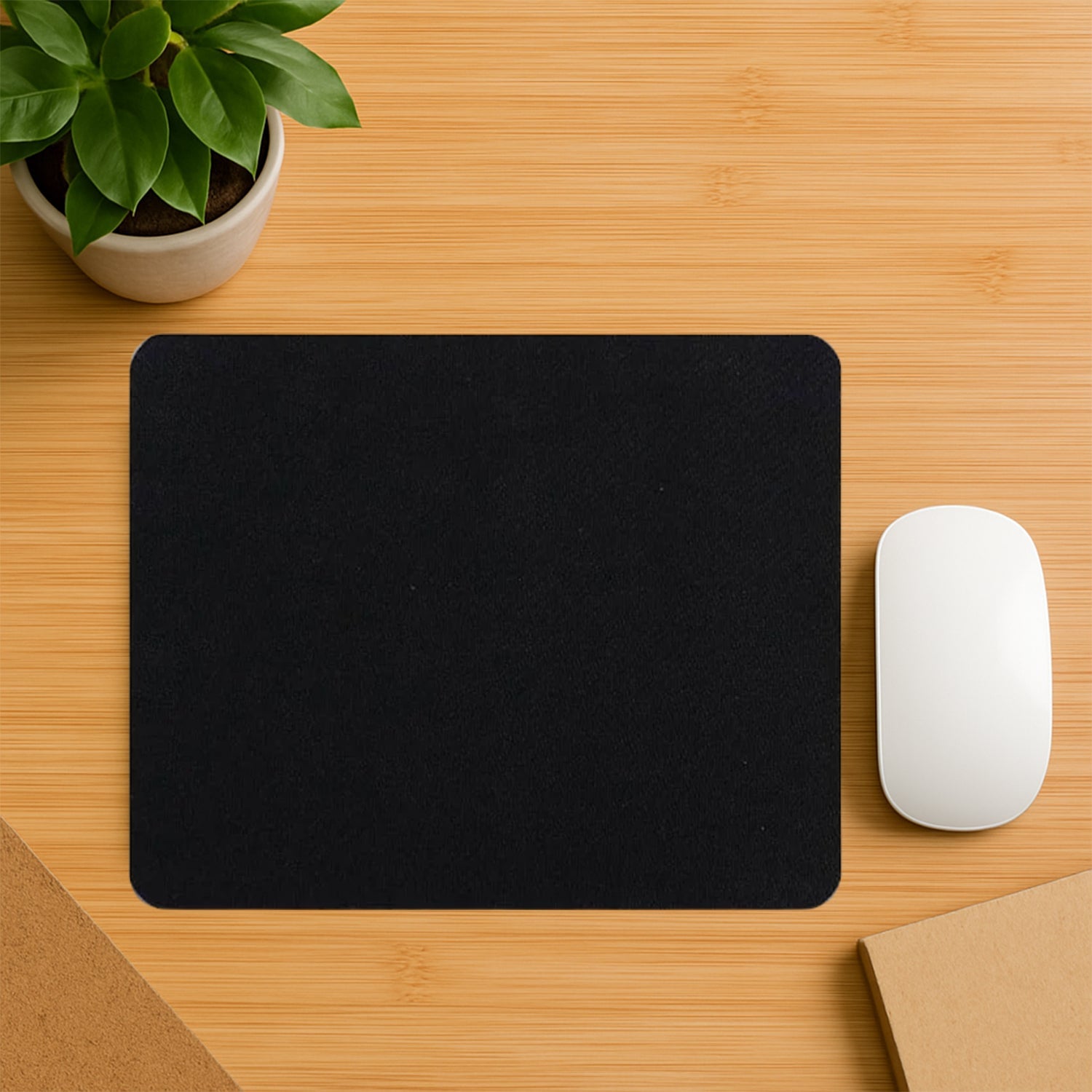 Classic black mouse pad for desktop computers.