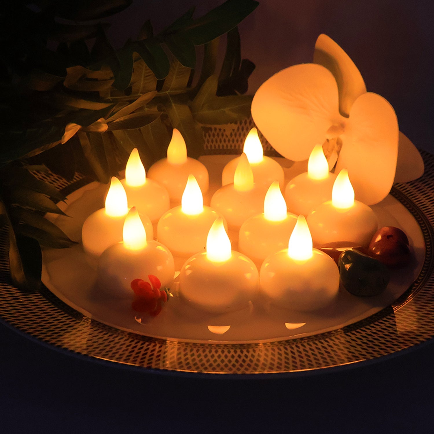 Set of 12 LED floating lotus candles with warm flickering light
