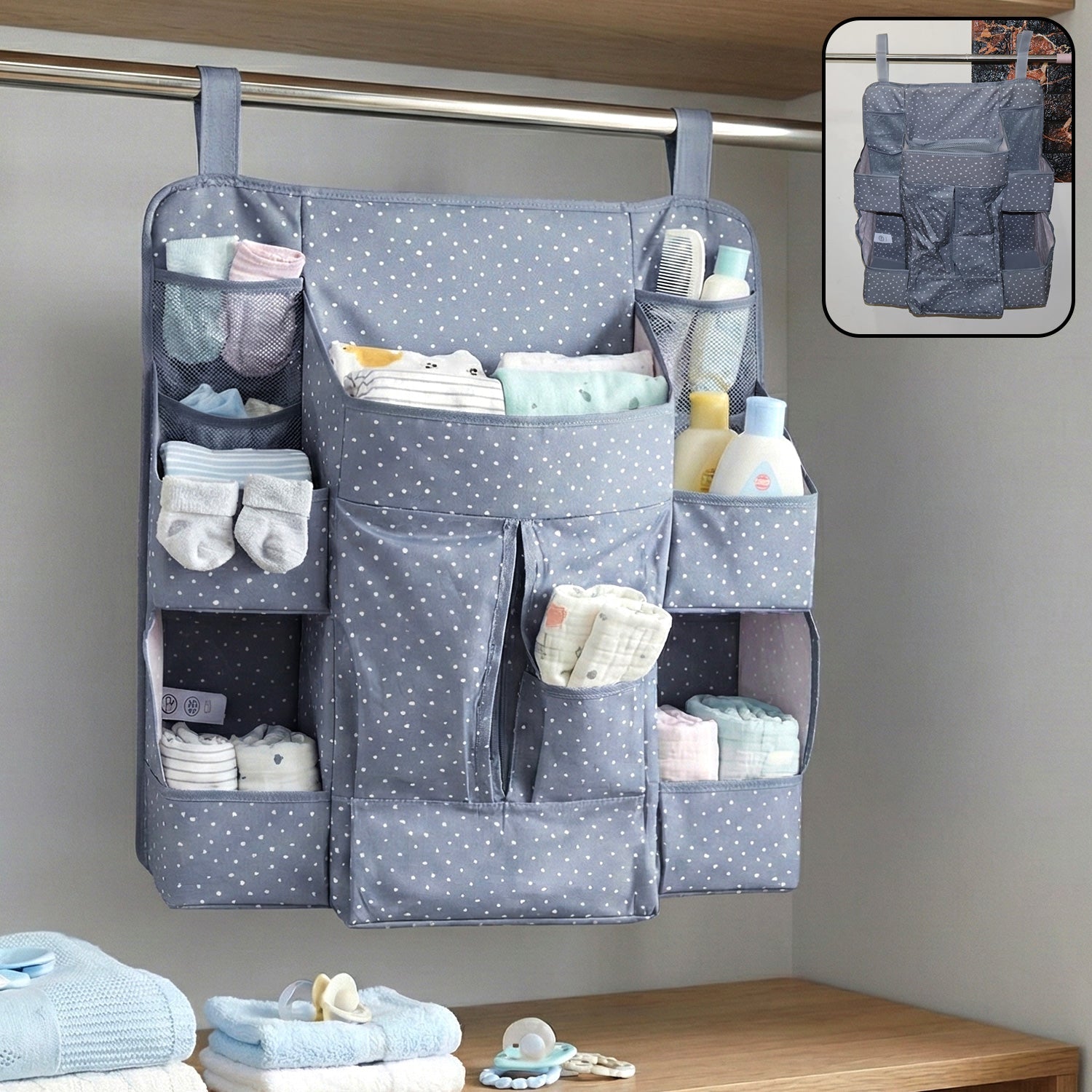 Hanging baby organizer with multiple pockets for diapers and clothes