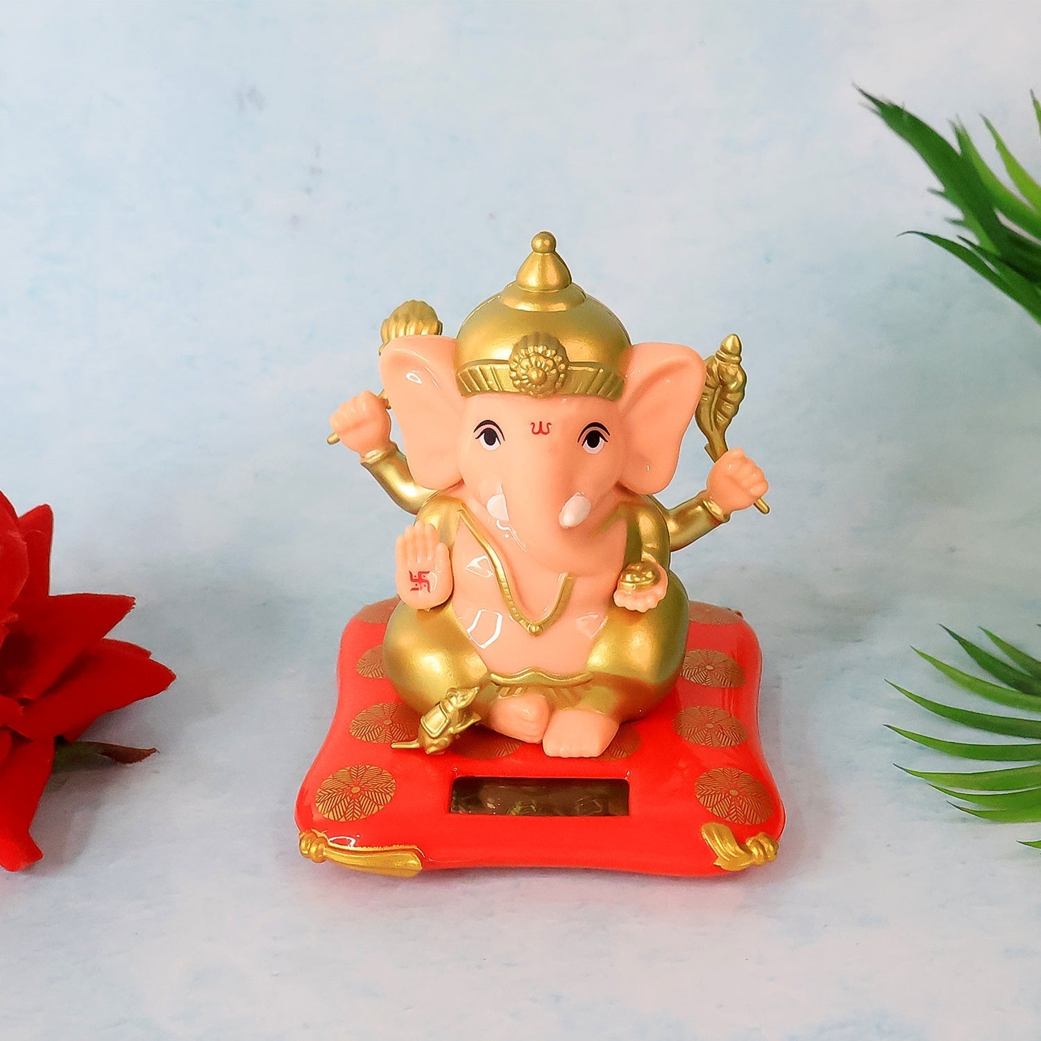 Medium Lord Ganesh Idol with solar-powered base illuminating gently on table