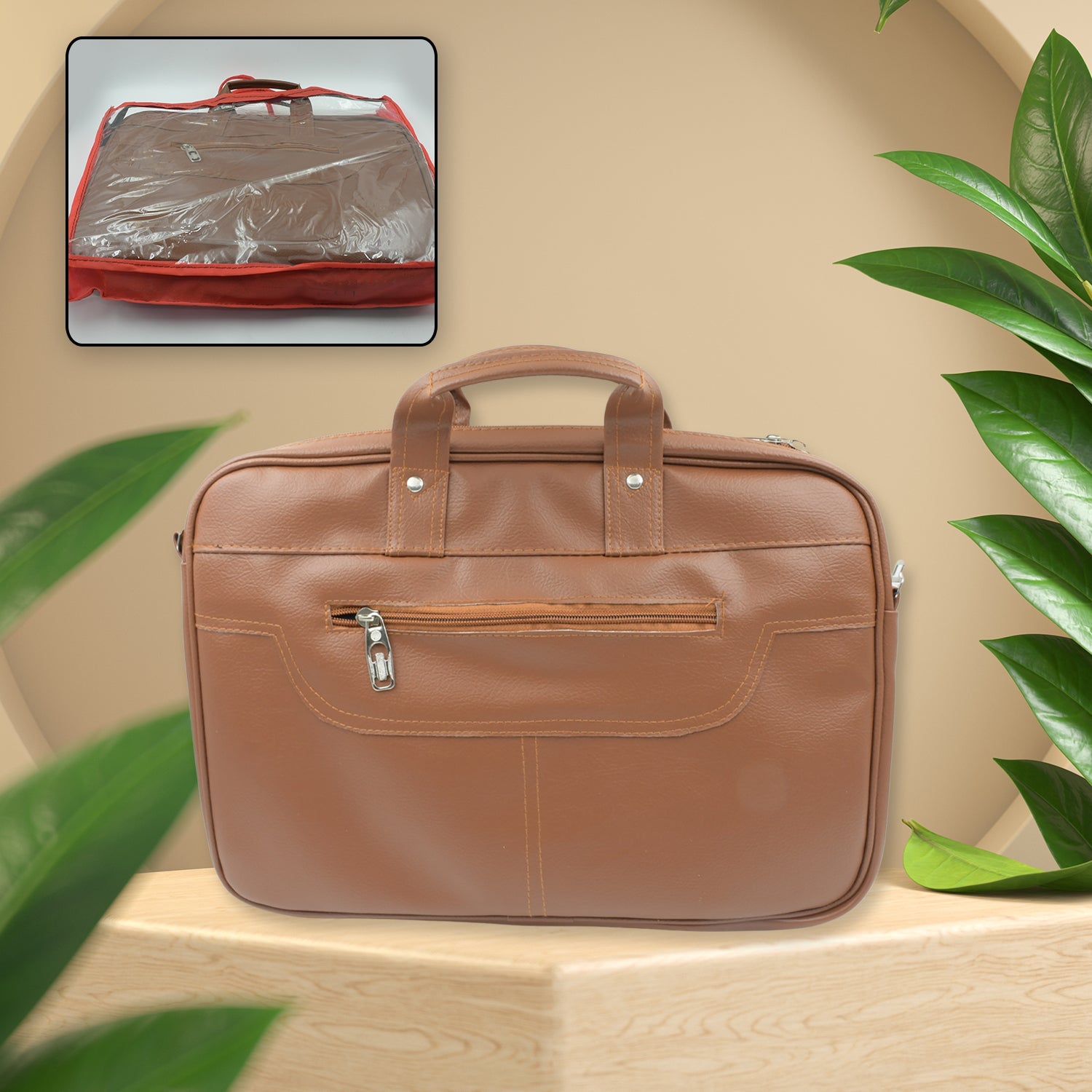 Front view of the Faux Leather Laptop Messenger Bag on a desk, highlighting its sleek design.
