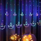 Vibrant multicolor Diya Curtain String Lights illuminating a festive window.