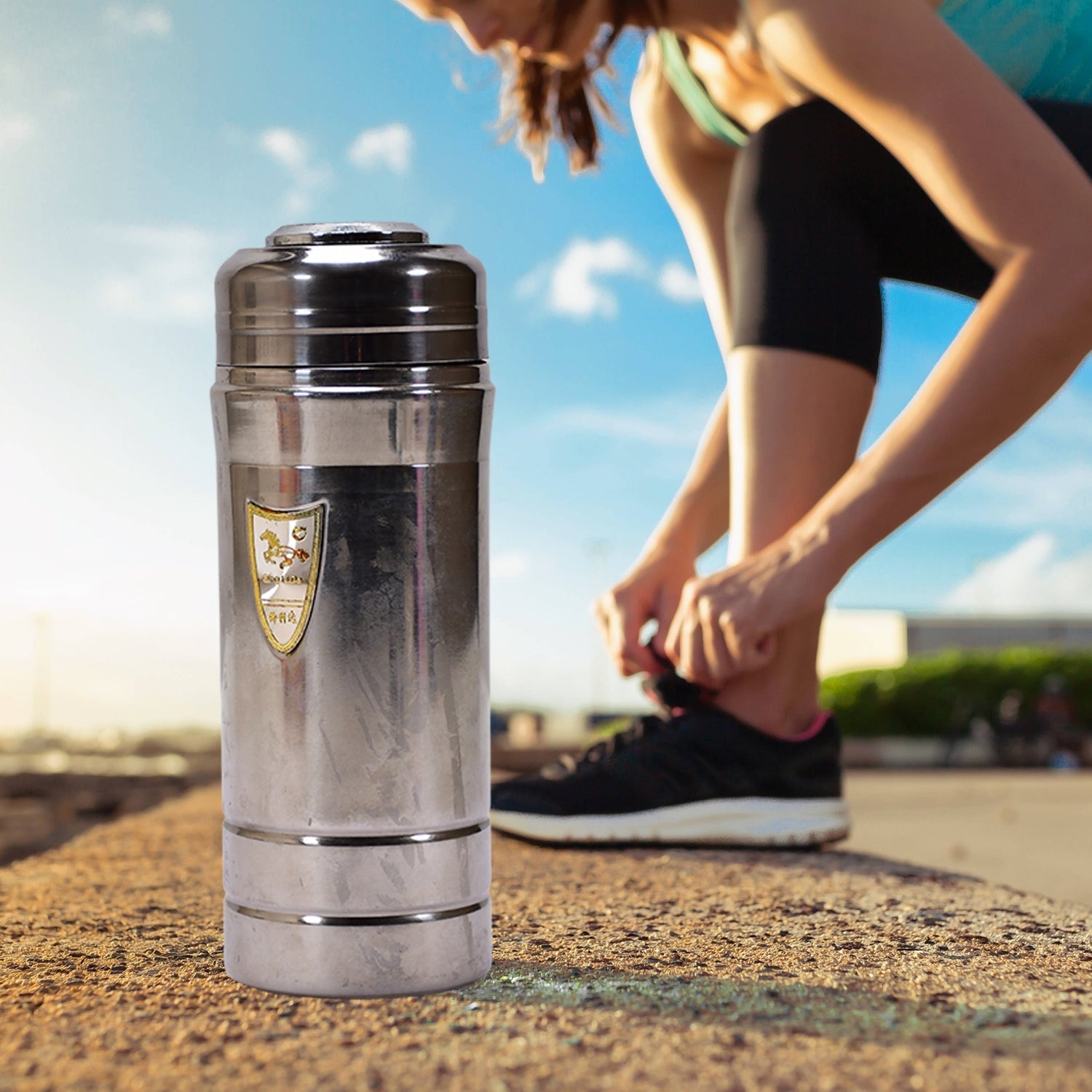 Sleek stainless steel vacuum insulated water bottle, 420ml, front view.