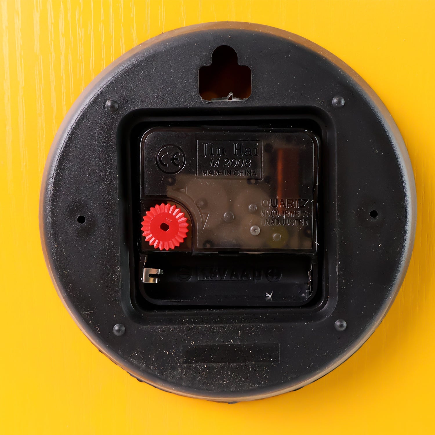 Chic yellow round wall clock perfect for modern home décor