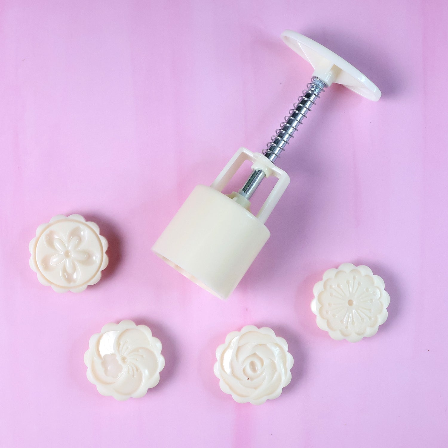 Pastry mold showing clear floral embossing created by spring press
