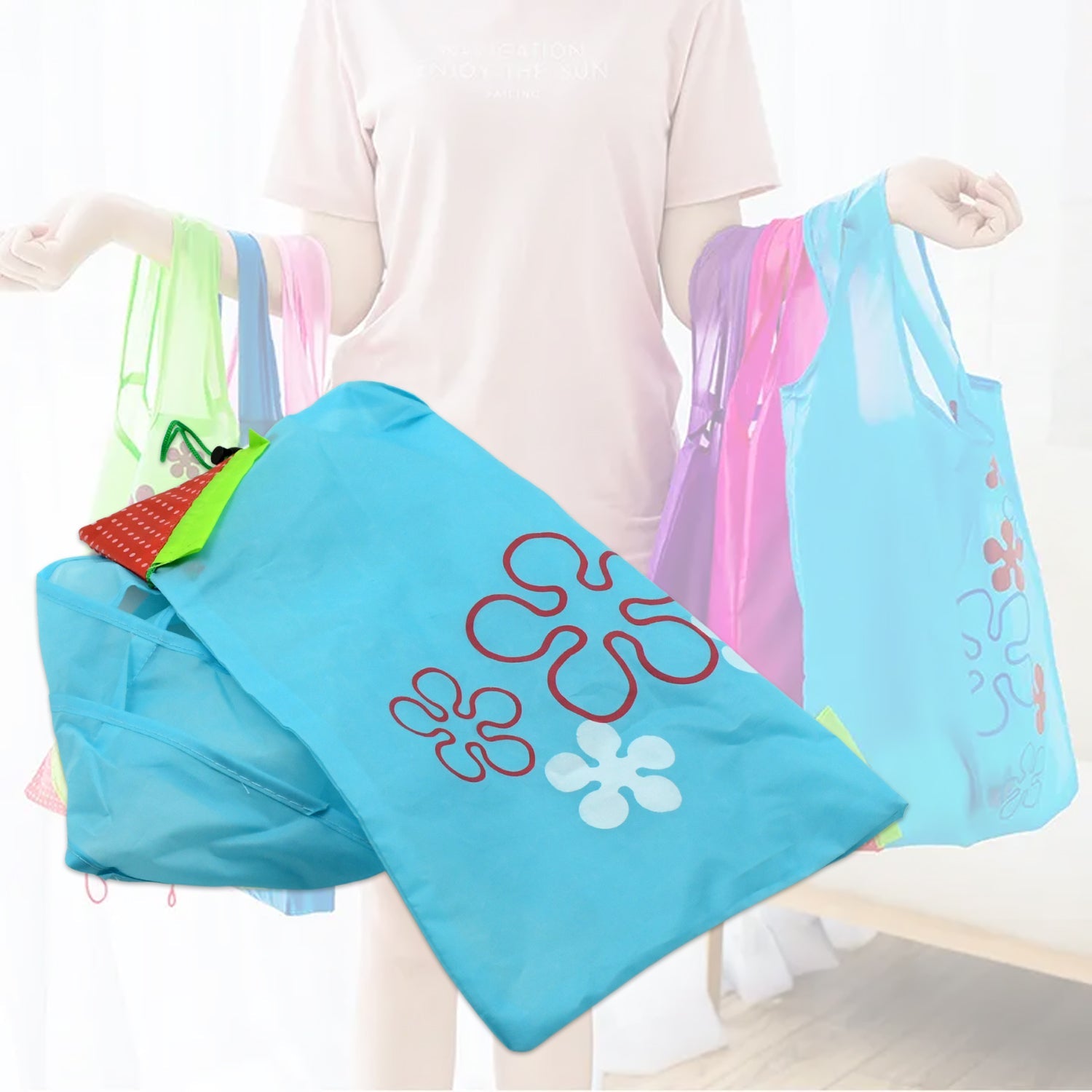 Three washable reusable shopping bags, highlighting their durable ripstop polyester material.