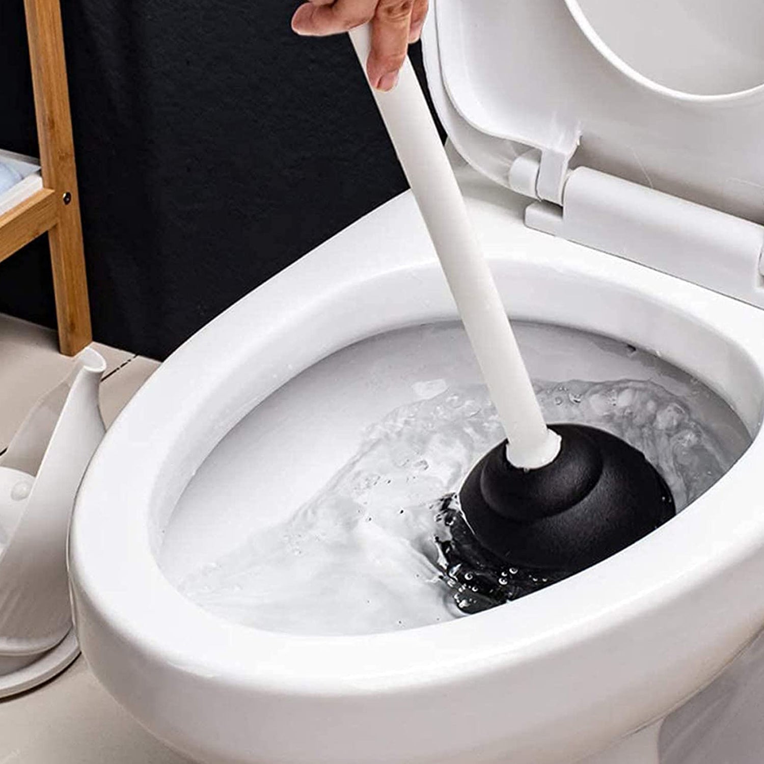 Side view of a multifunctional toilet plunger for drains.