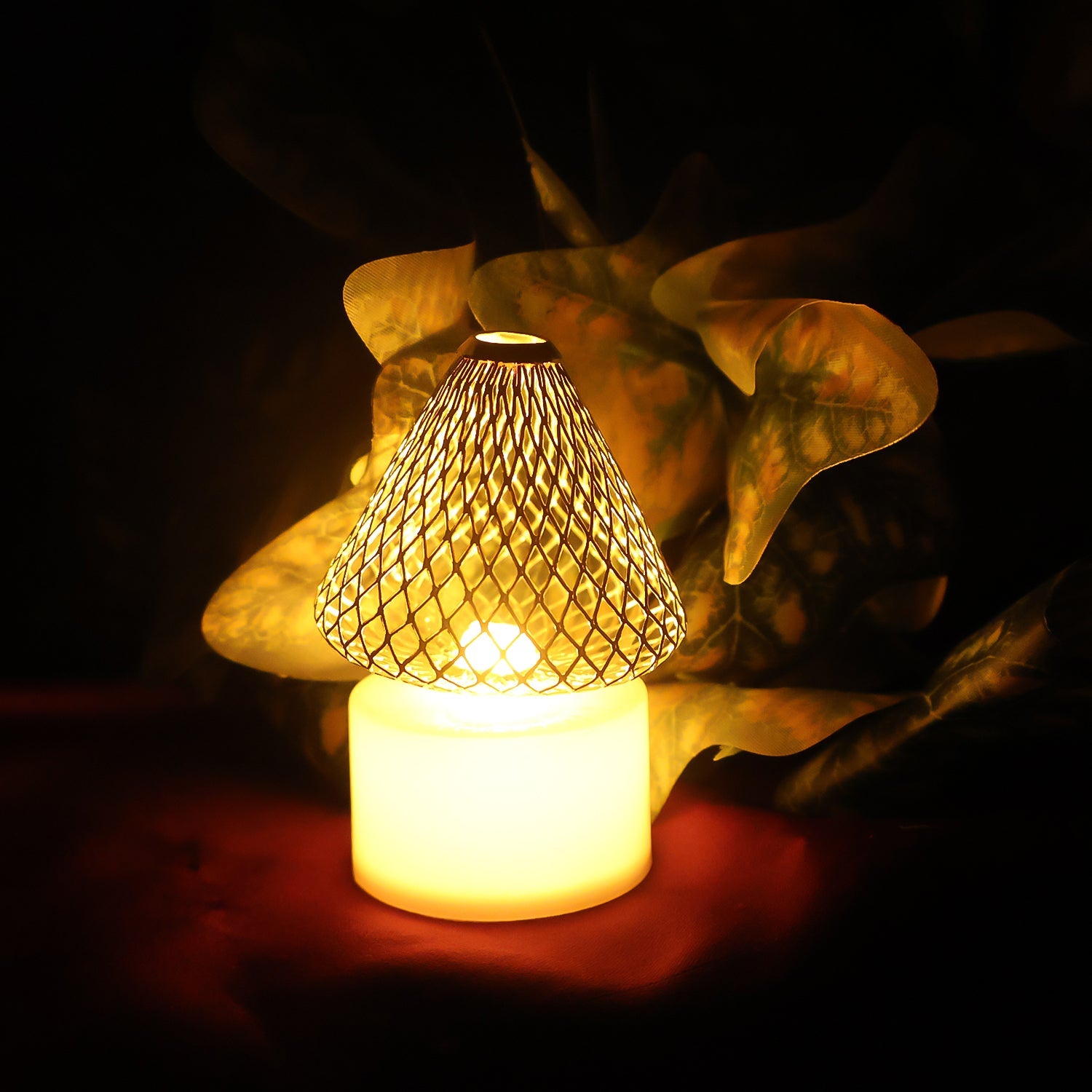 Set of 12 battery operated LED tealight candles with decorative golden net covers