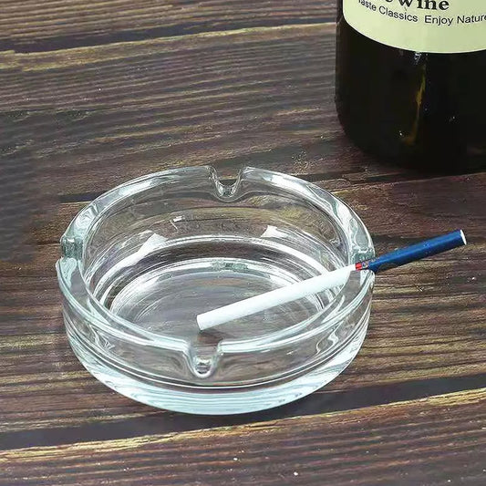 Elegant round crystal glass ashtray, perfect for modern home decor.