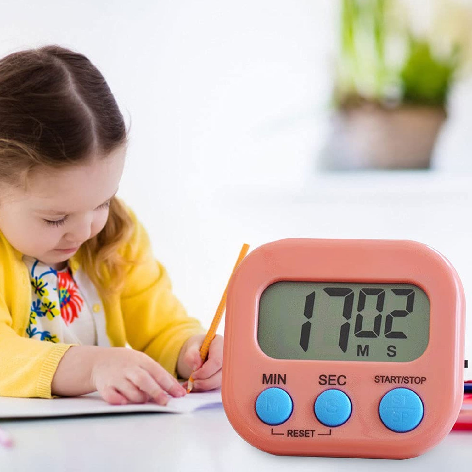 Compact digital kitchen timer with clear, large digits for easy reading.