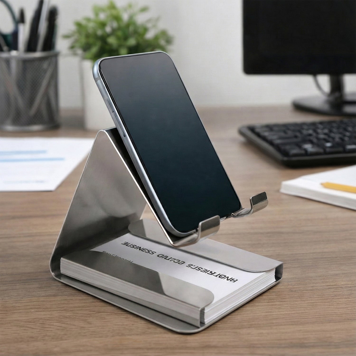Compact small desktop mobile phone stand holder on office desk