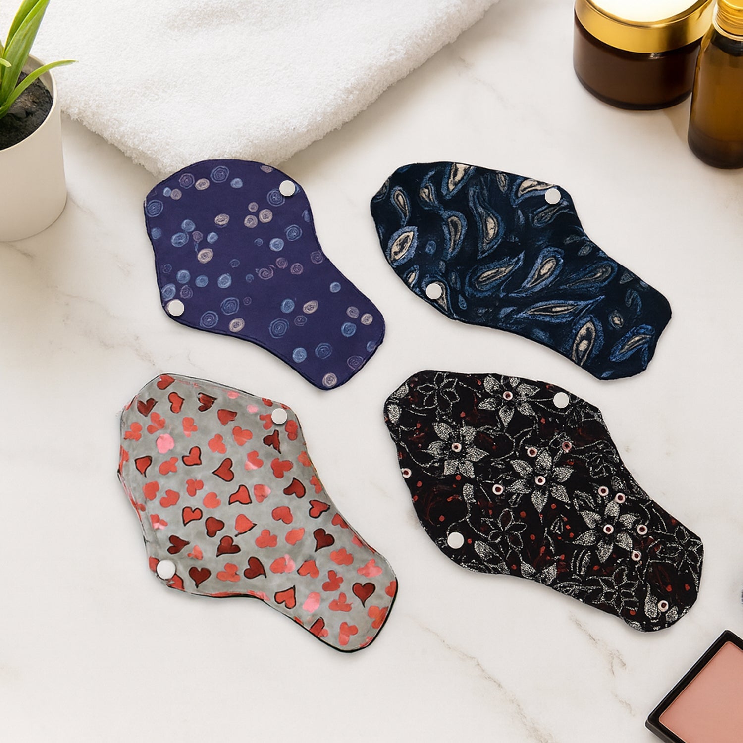 Set of reusable cloth sanitary pads in assorted prints providing eco-friendly menstrual protection