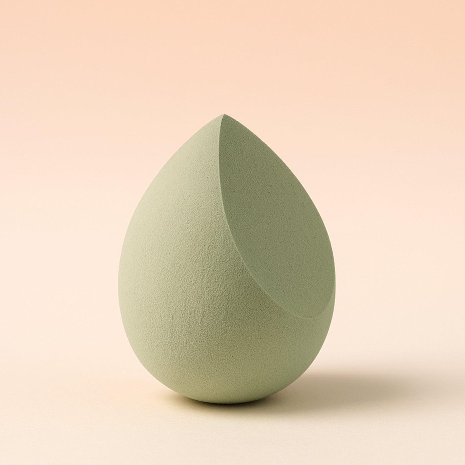 Close-up shot of the soft, non-latex texture of the BeautyBare makeup sponge.