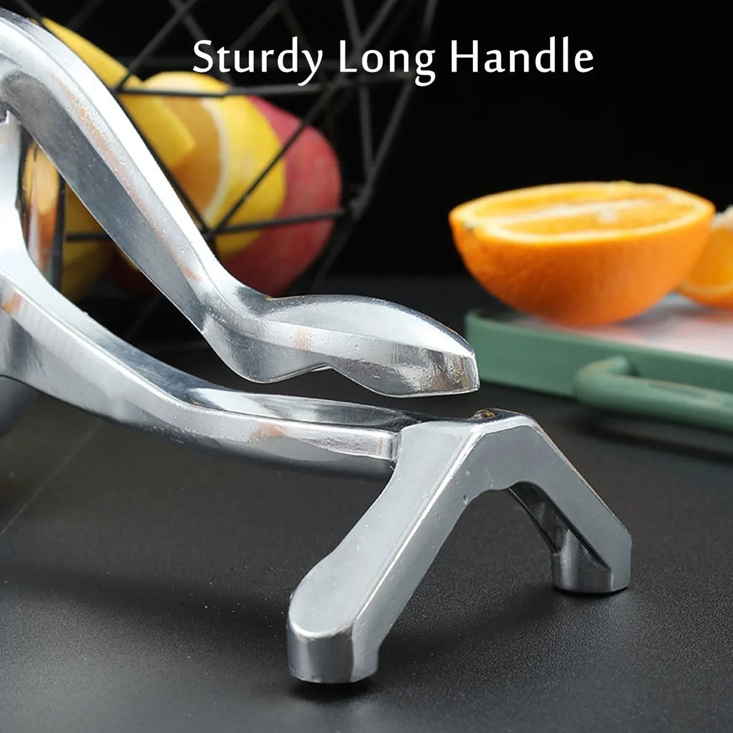 Close-up of the durable aluminium manual fruit juicer's pressing mechanism.