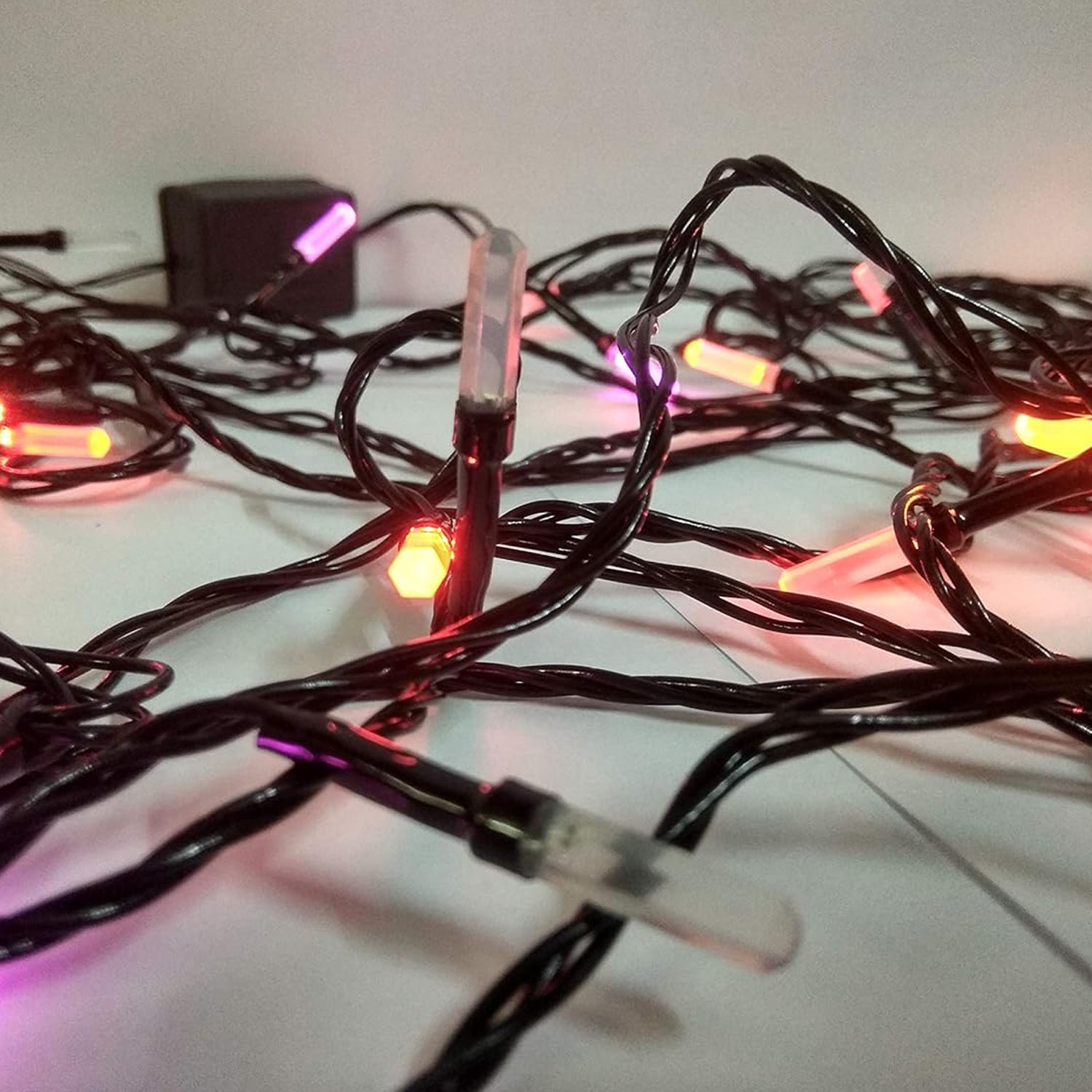 Flexible 3M multi-color LED string lights draped for indoor decoration.