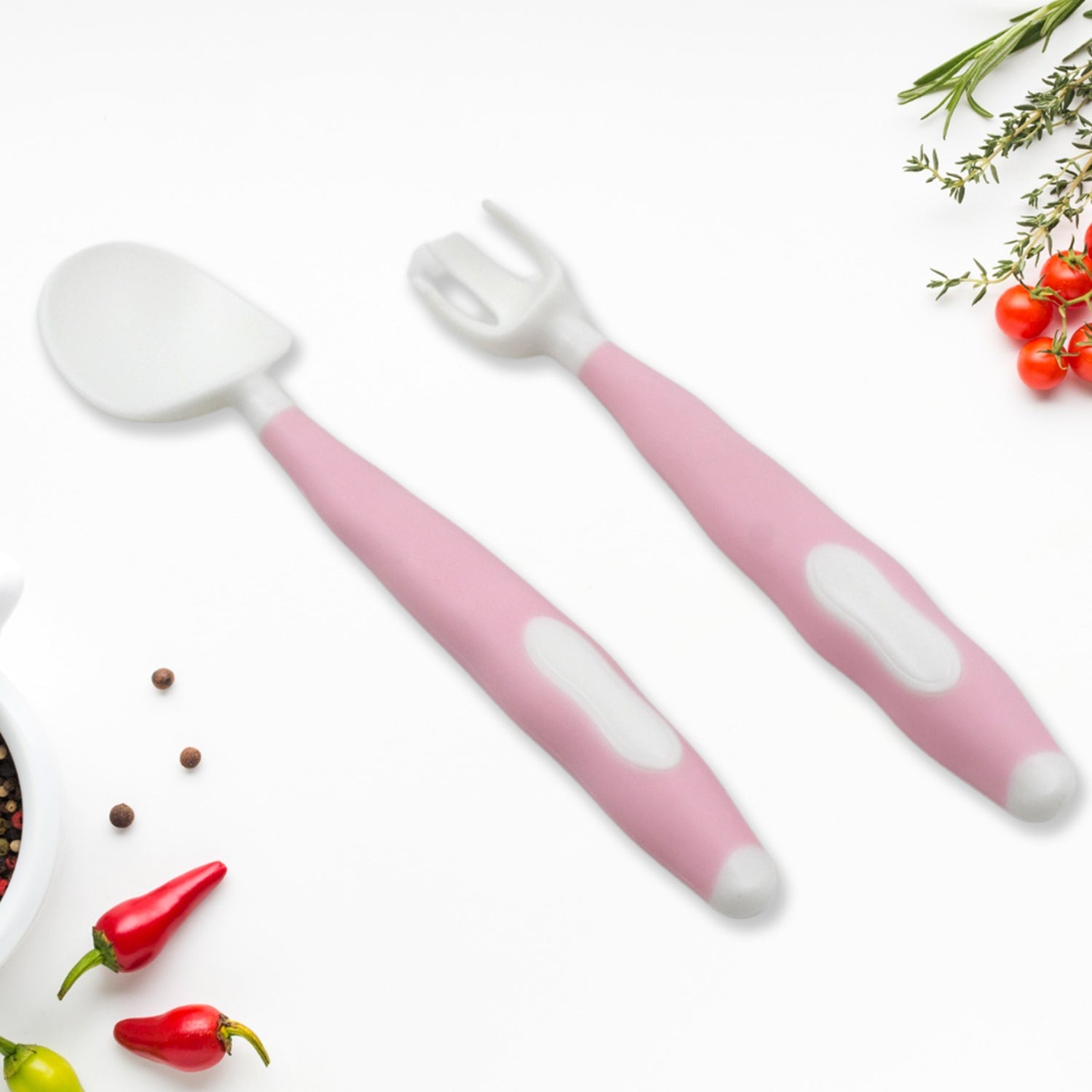 Close-up of the flexible, bendable handles of the toddler spoon and fork.