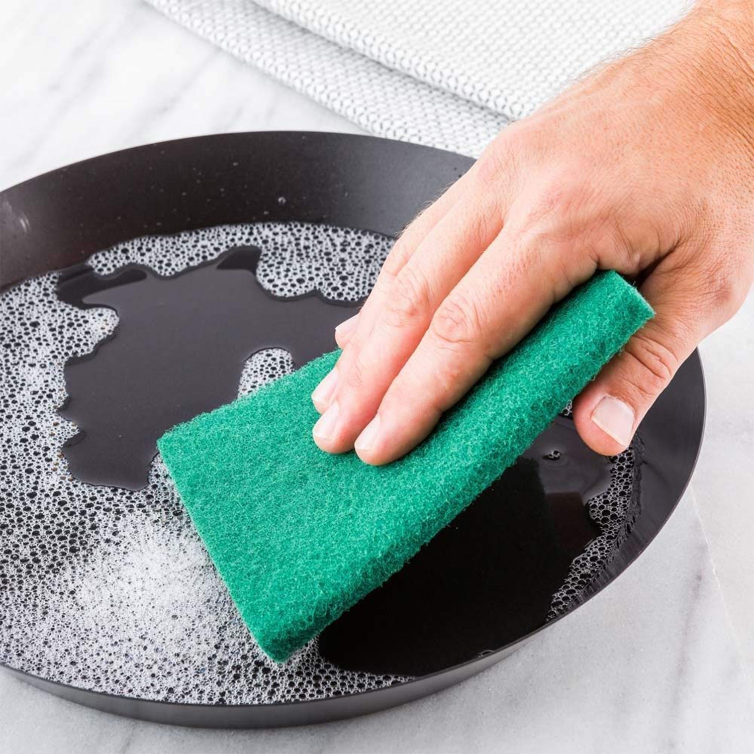 Pack of 10 aqua green scrub sponge pads with advanced stain cutter technology.