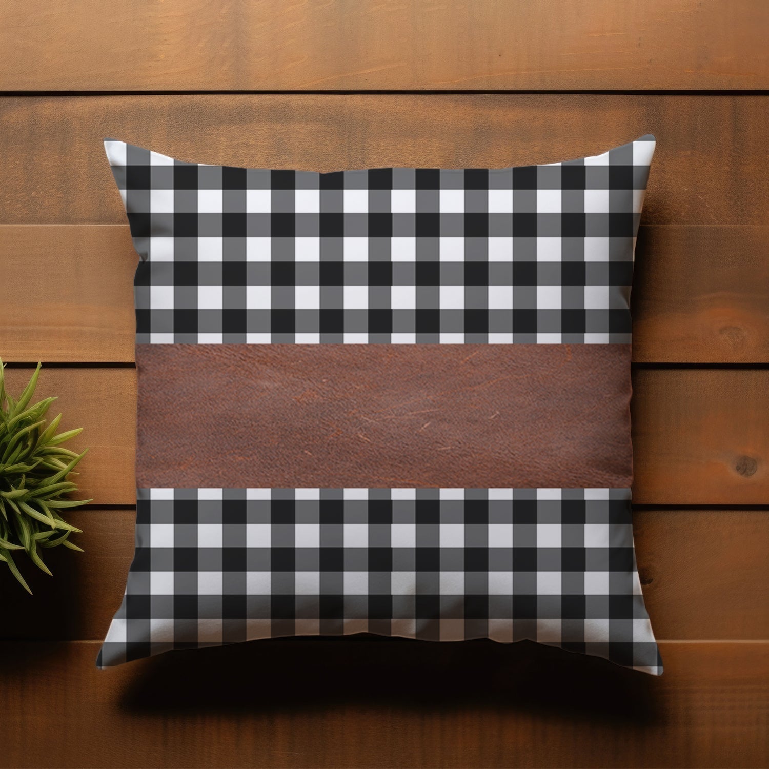 Detailed view of the rich texture and stitching on the decorative leather pillow cover.