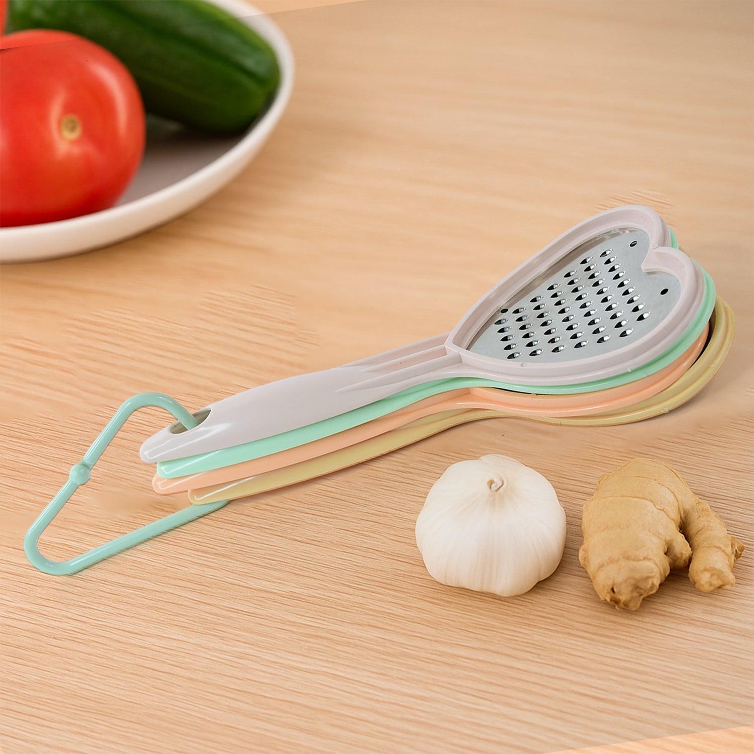 The heart-shaped slicer in action, neatly cutting vegetables for a healthy meal.
