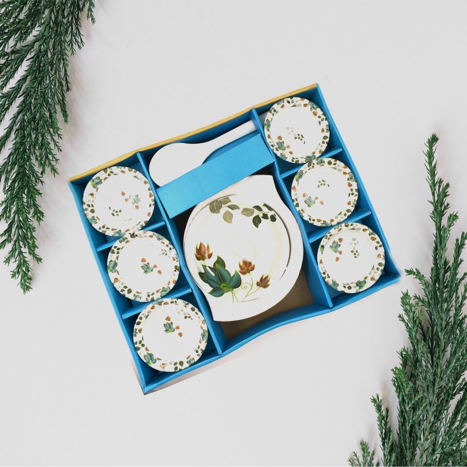 Elegant 9-piece pudding serving set arranged on a table.