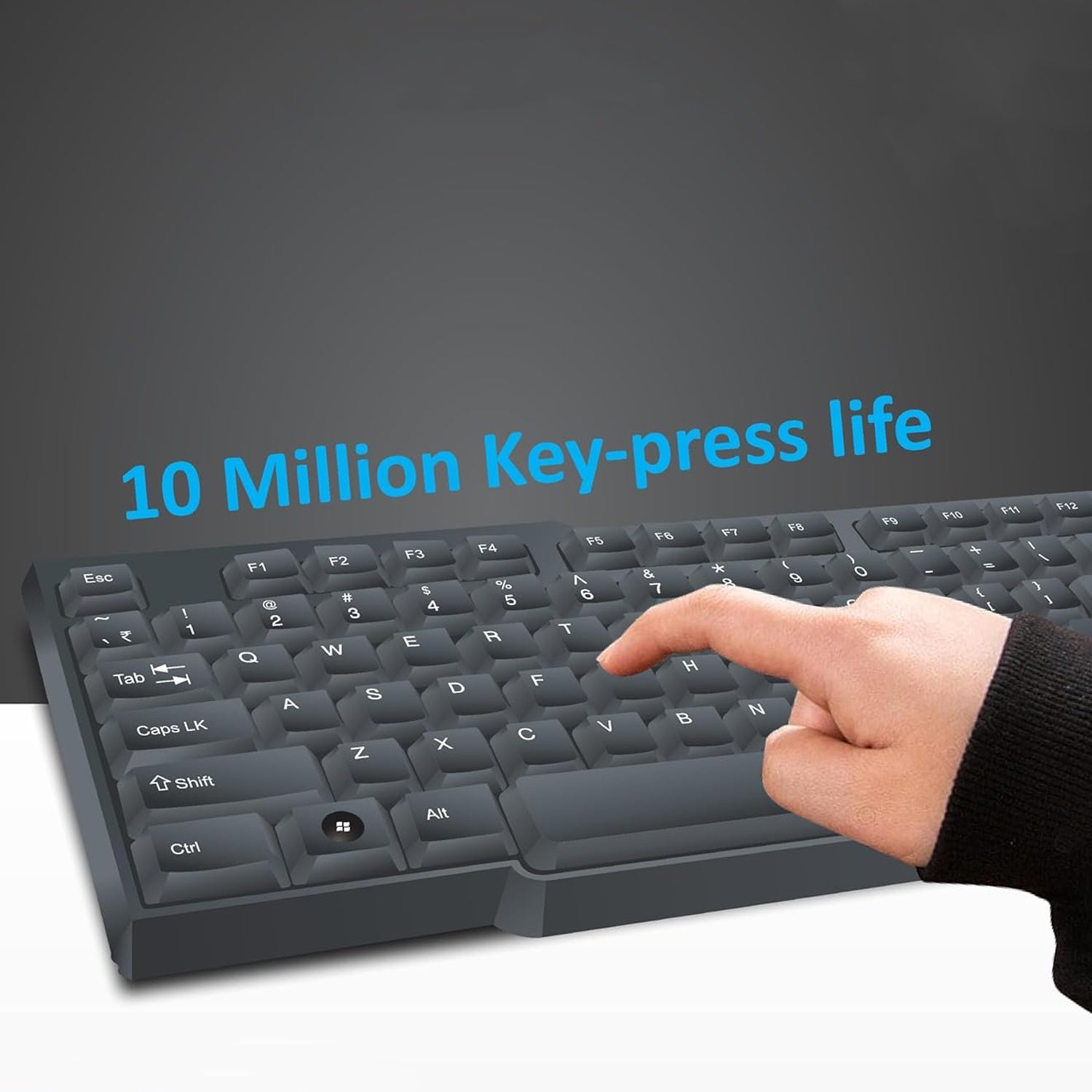 User typing on the sleek black wired USB keyboard.