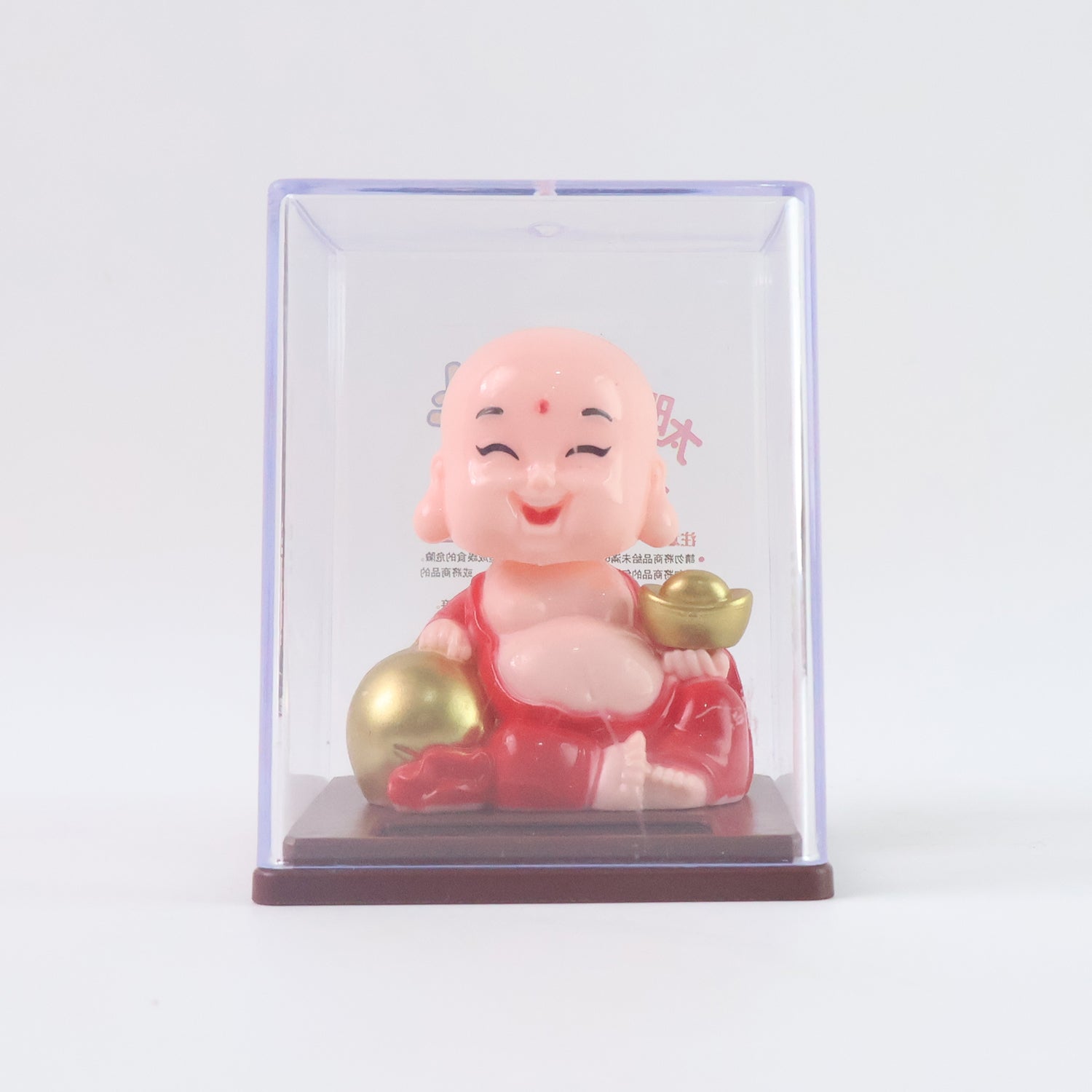 Top-down view of the Solar Buddha Car Ornament, showcasing its compact design and vibrant colours.