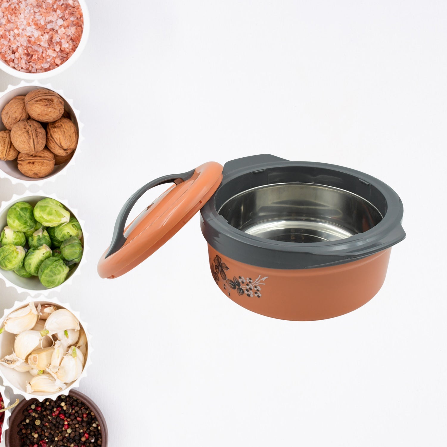 Beautiful food serving hot pot with floral design, suitable for any dining setting.