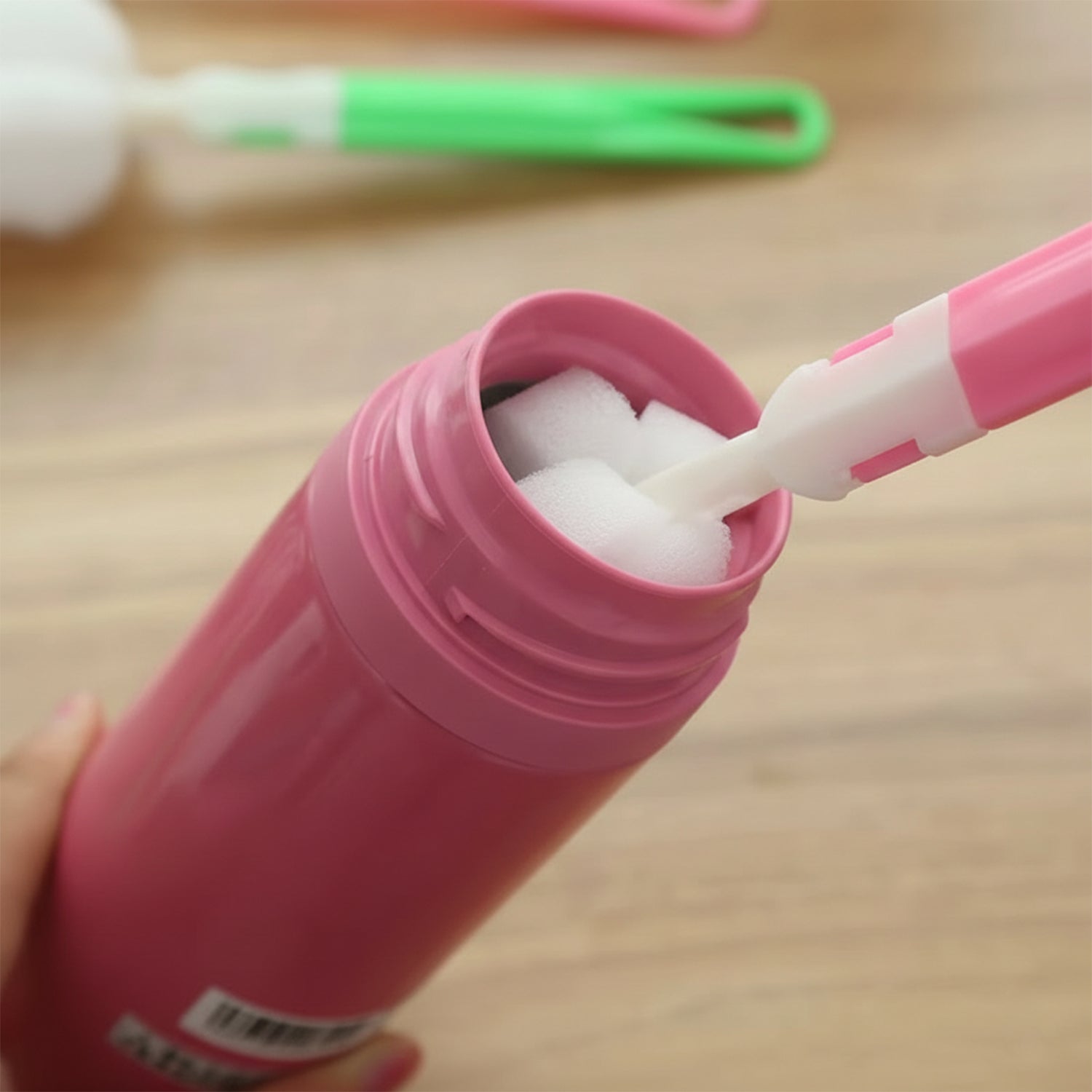 Scrub brush with flexible head and silicone bristles for safe cleaning