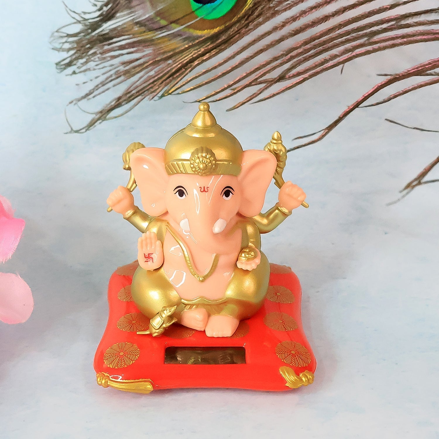 Side profile view revealing intricate craftsmanship of medium Lord Ganesha figurine