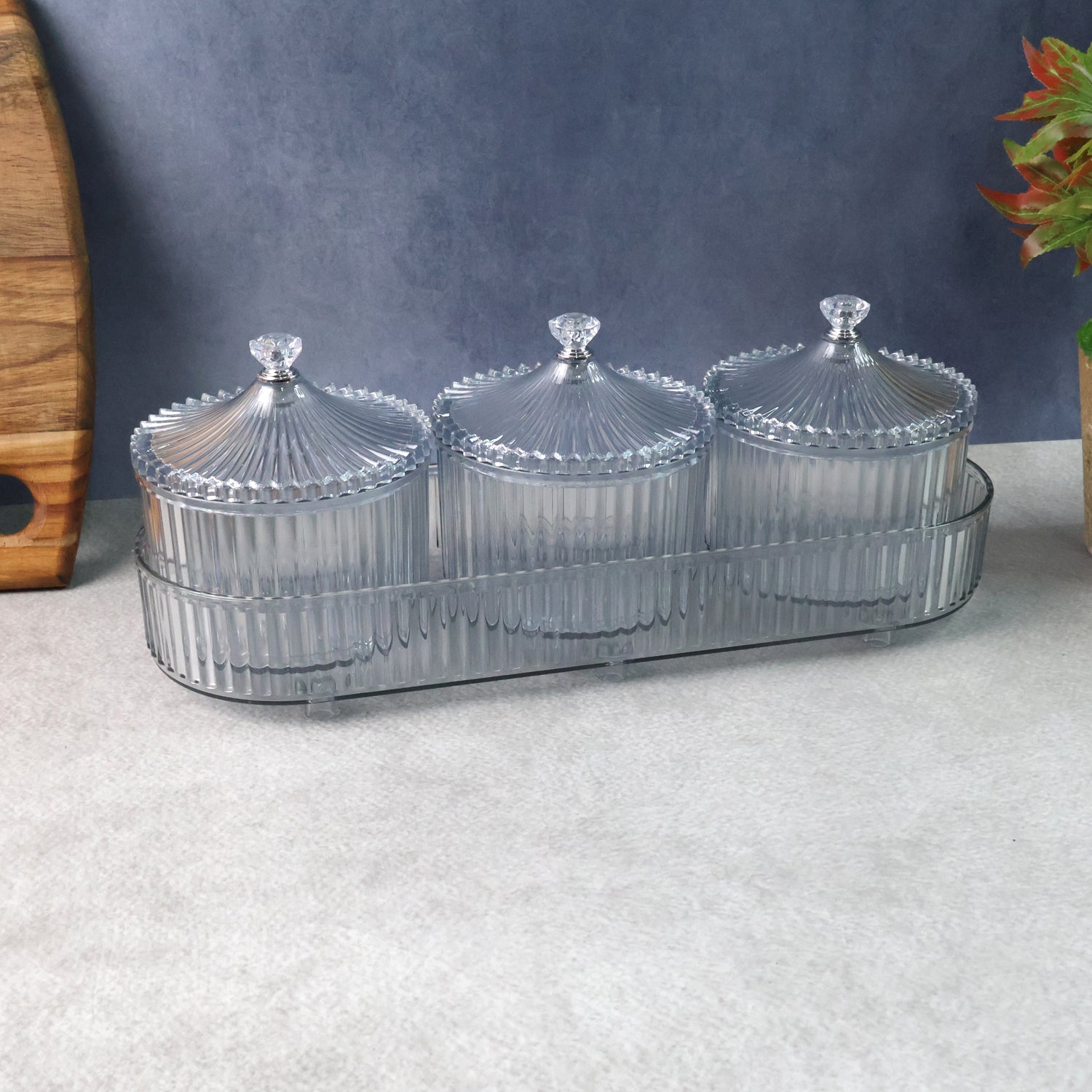 Single snack storage jar from dry fruit storage set on kitchen surface