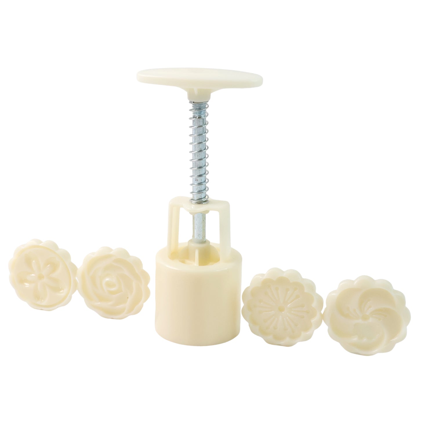 Spring press cookie mold shaping a cookie with elegant floral pattern