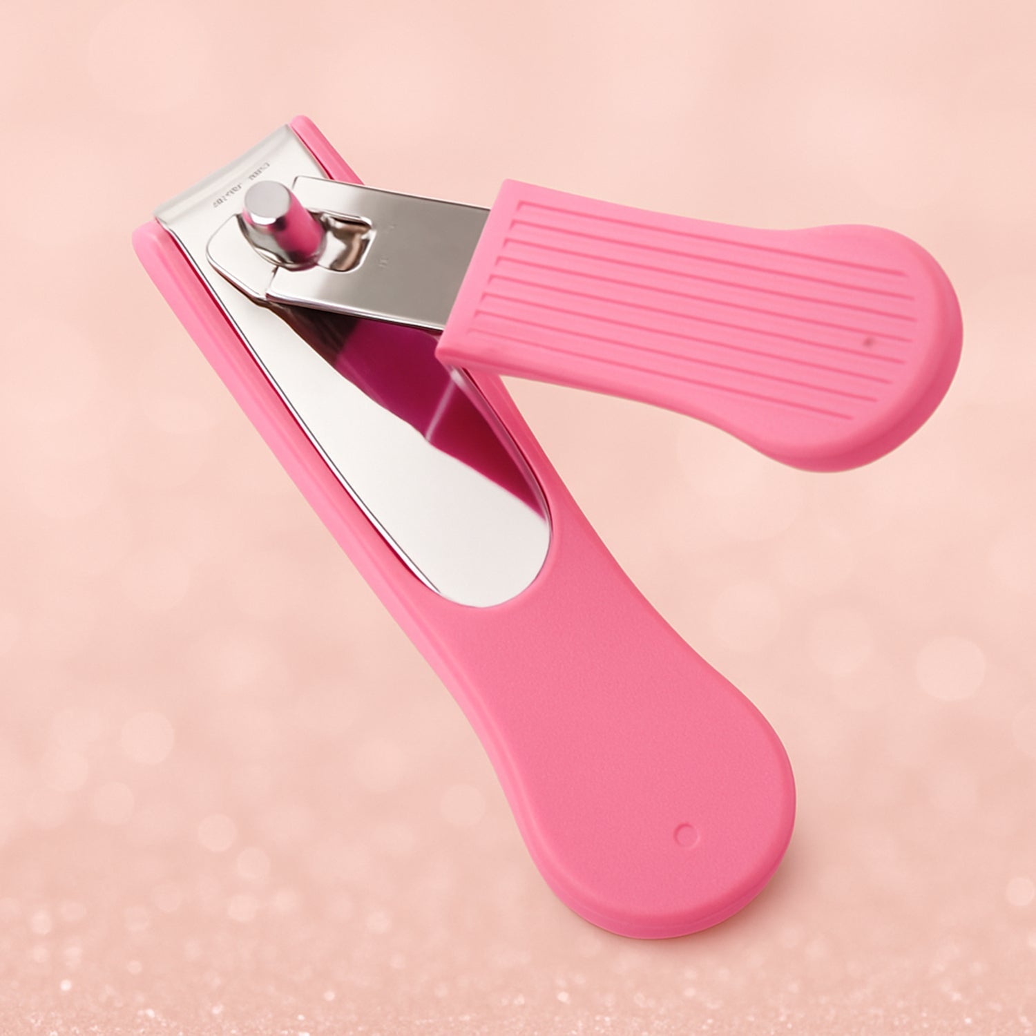 Close-up of ergonomic lever on AuriGlam nail cutter for comfortable grip