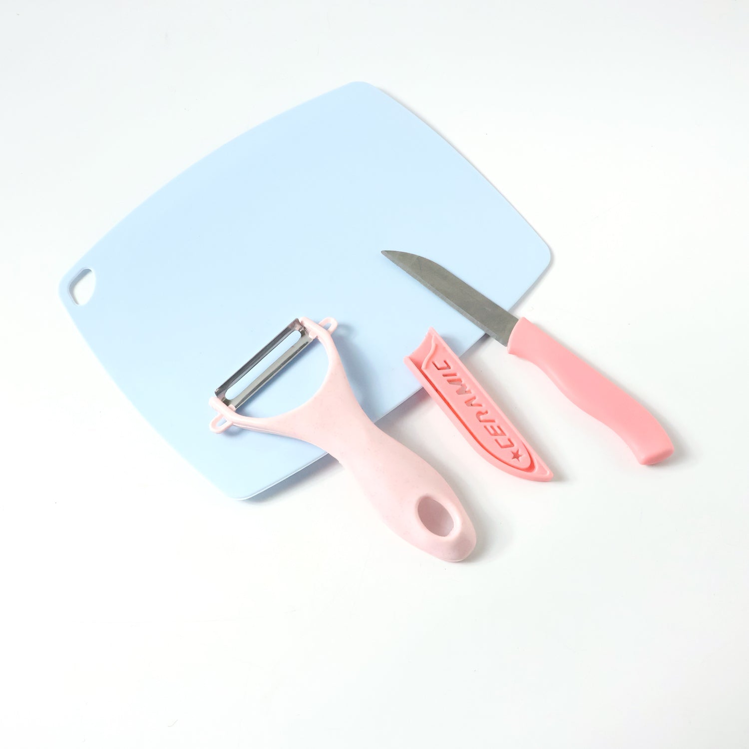 Knife and peeler with cutting board kitchen prep kit
