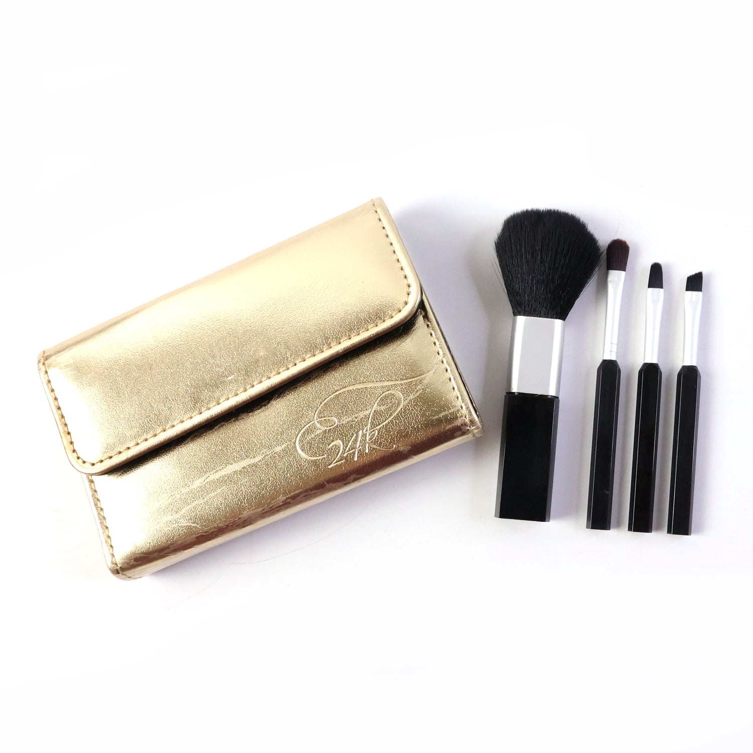 Professional makeup brush set displayed with a carrying pouch