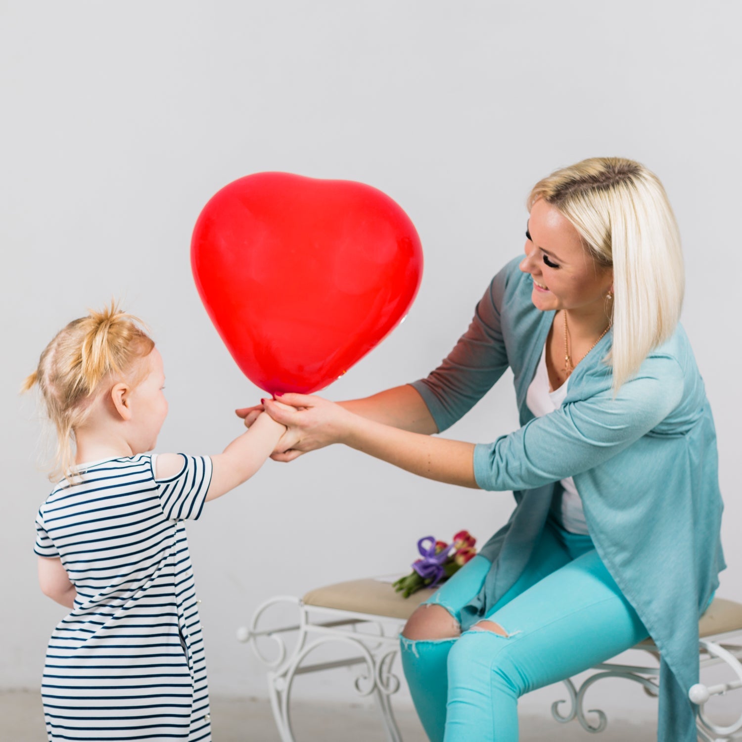 Brightly colored heart shaped balloons creating a joyful atmosphere for a celebration.