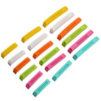 Various food items like bread and snacks kept fresh with plastic food clips.