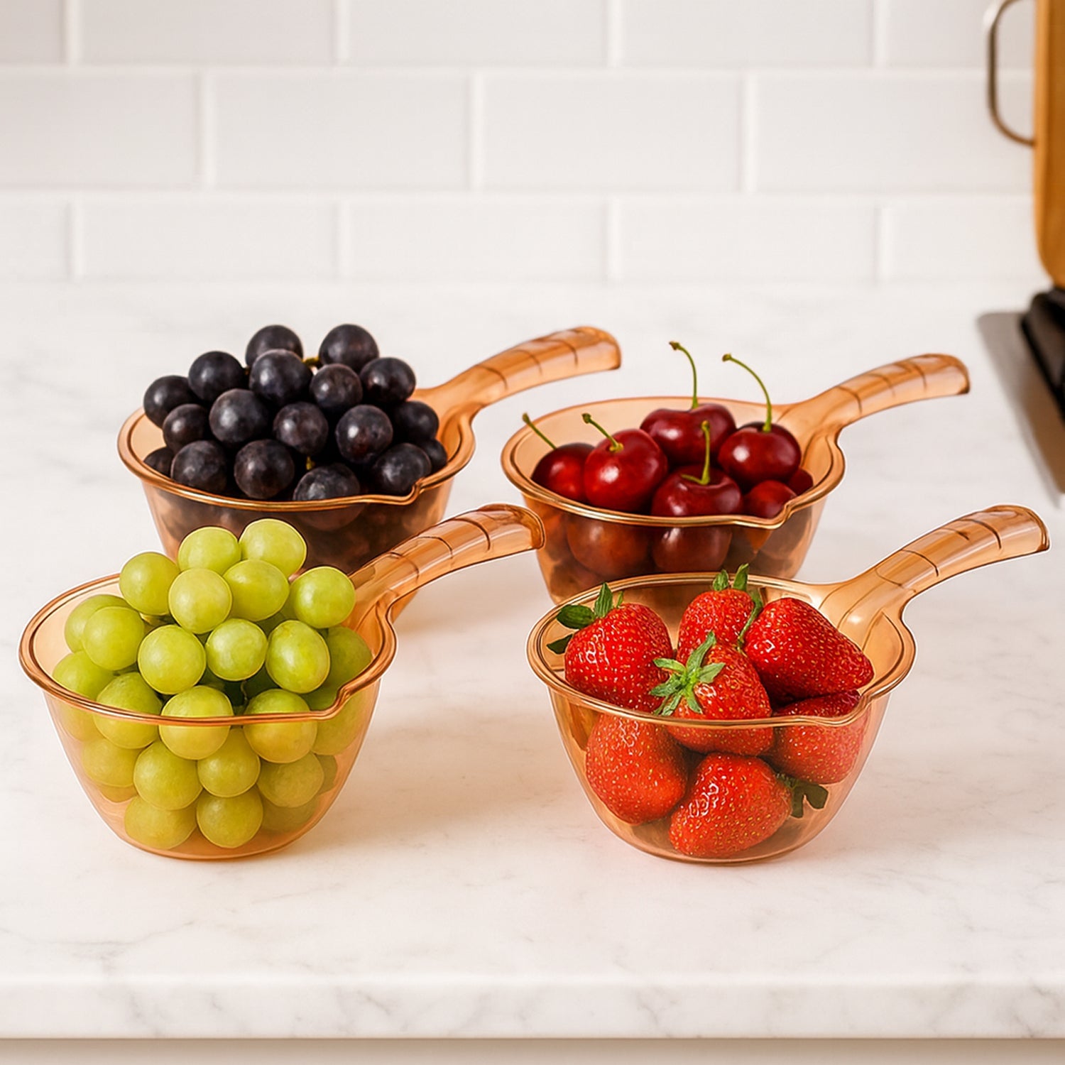 Collection of multipurpose kitchen washing & straining bowls stacked for storage