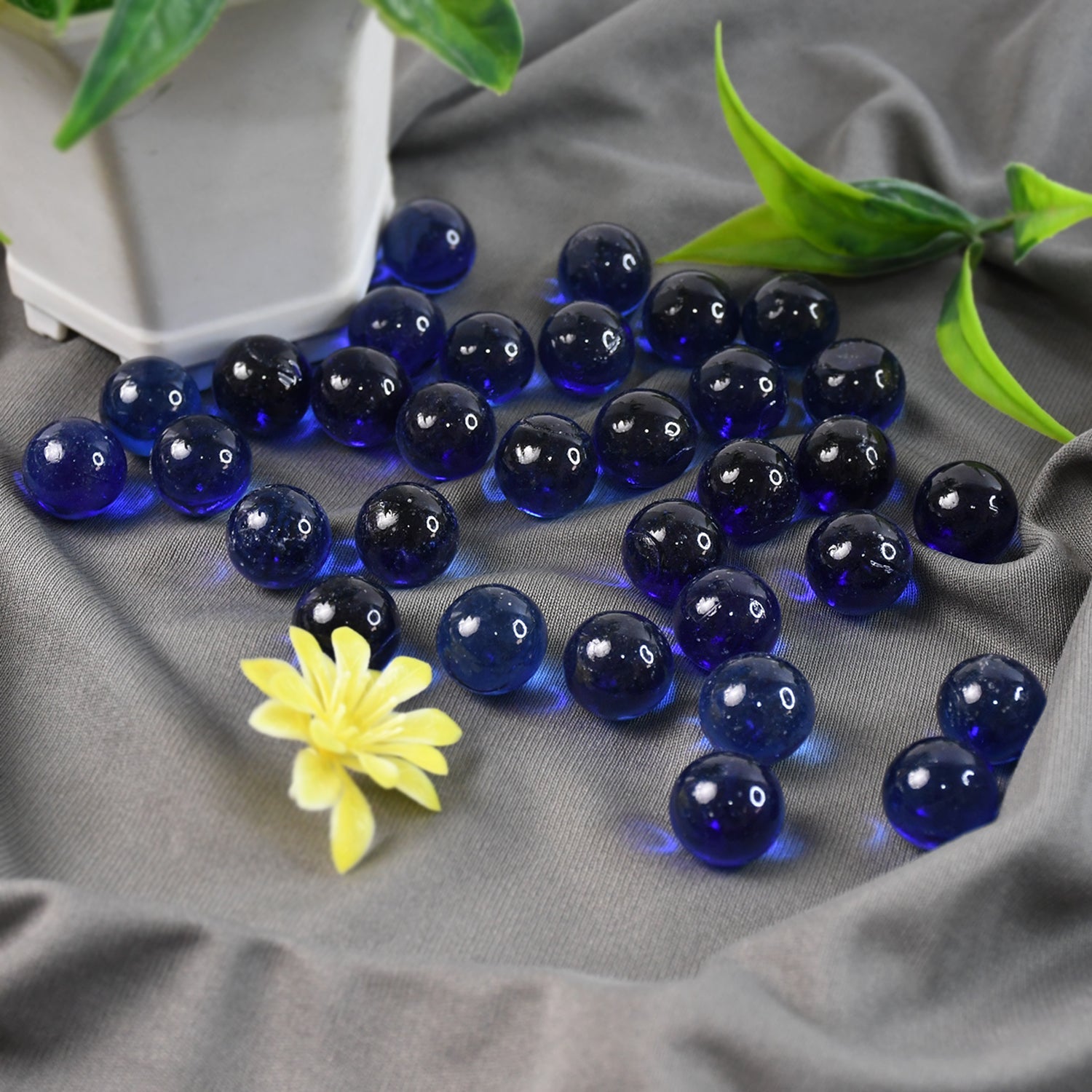 Glow in the dark decorative pebbles creating a vibrant fish tank landscape.