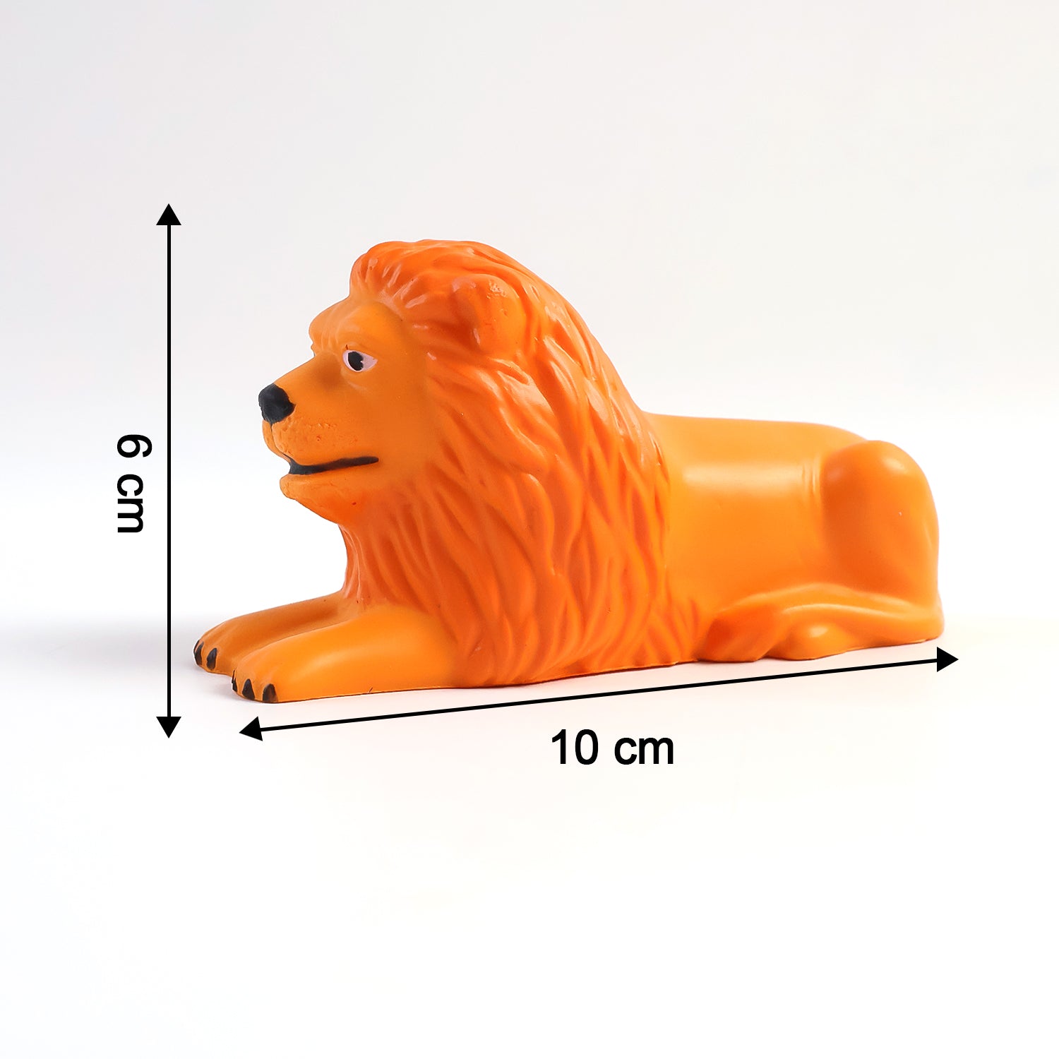 Close-up of lion dashboard toy showing adhesive base for stability