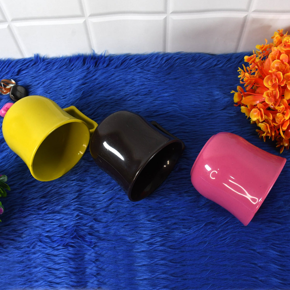 Person enjoying a beverage in a reusable plastic coffee mug.