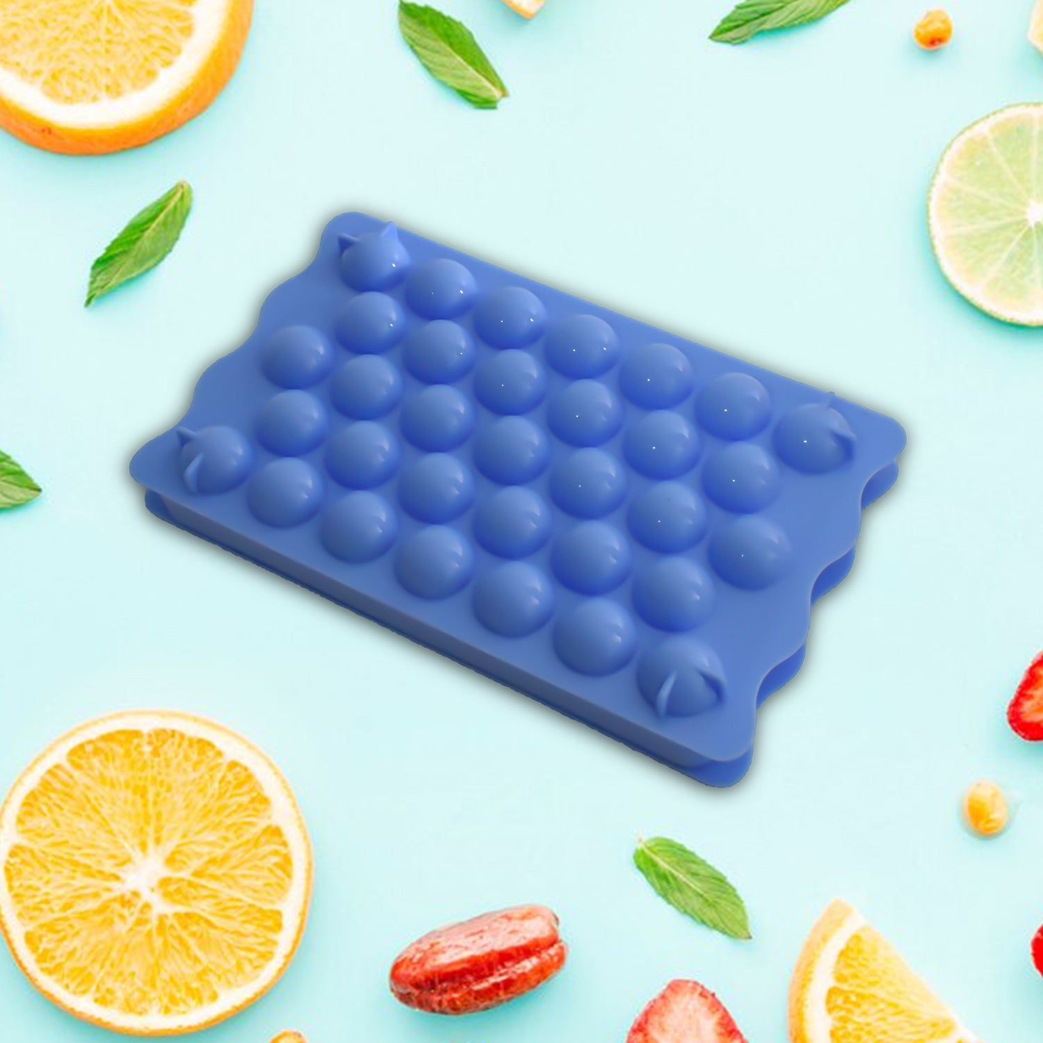 Close-up of the Lollipop Candy Maker's mold, showing candy forming process.