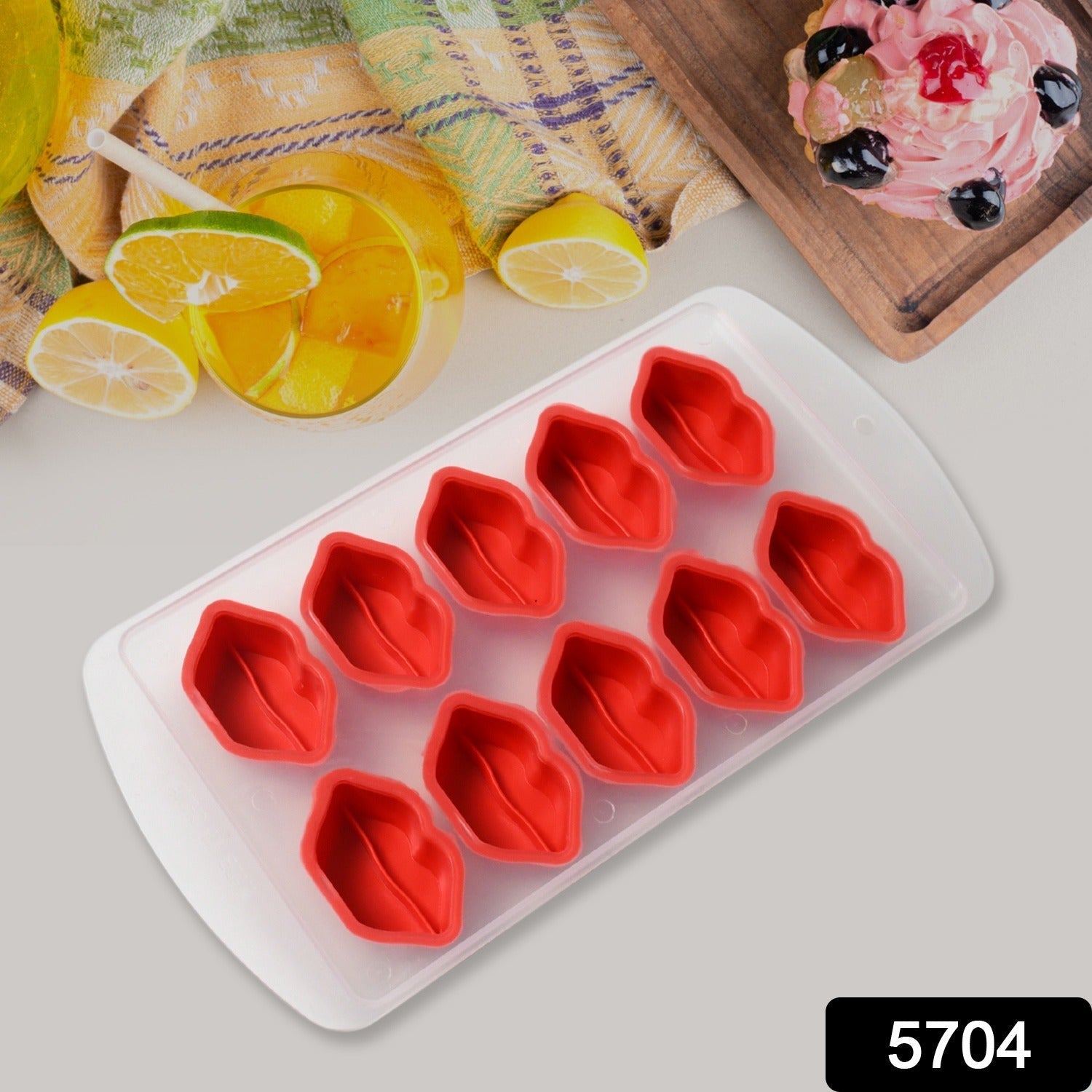 Flexible silicone mold for creating fun fruit-shaped ice cubes or cake decorations.