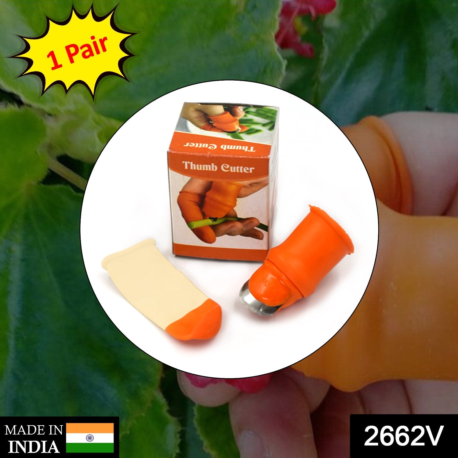 The V Thumb Cutter held on a thumb, ready for peeling vegetables.