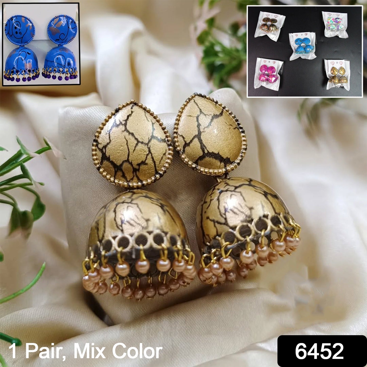 Model showcasing elegant Jhumka Earrings with a traditional Indian outfit, highlighting their festive appeal.