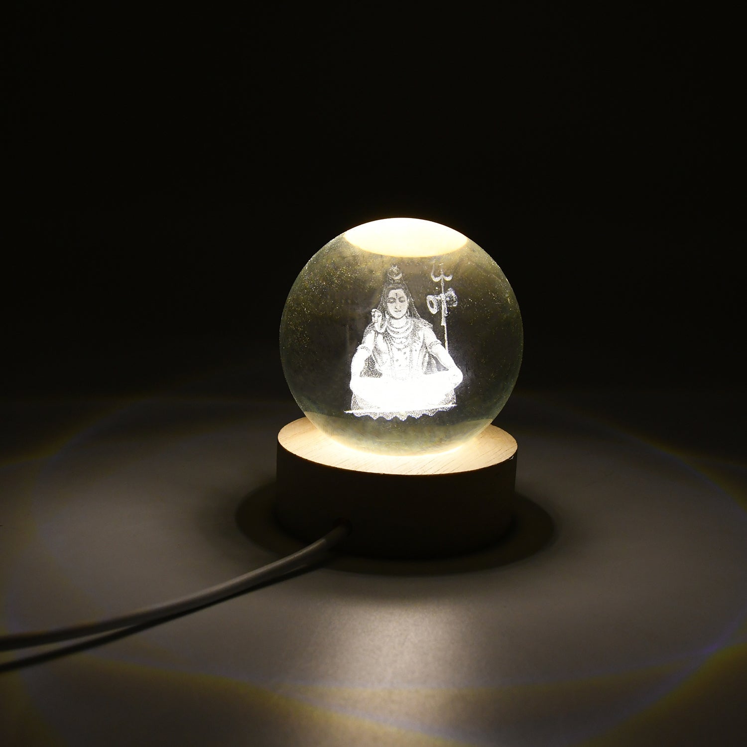 A captivating 3D Crystal Ball Lamp showcasing an intricate design, illuminated with a warm glow.