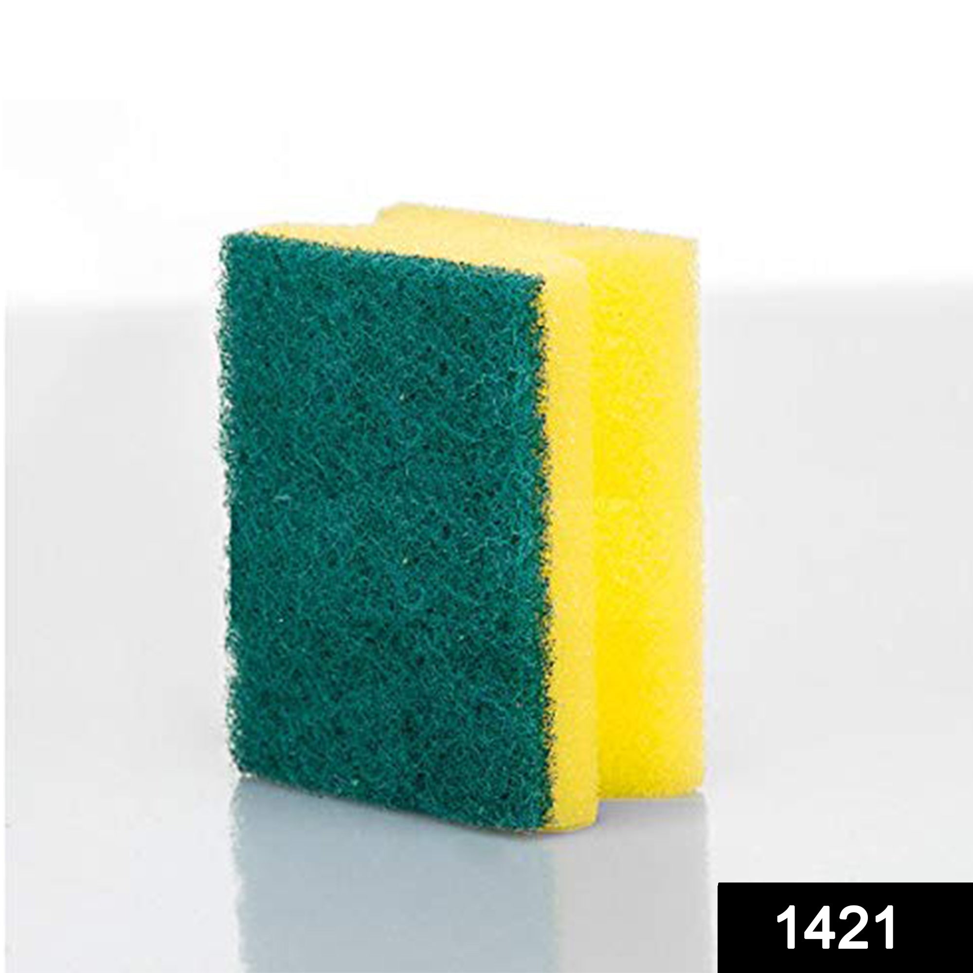 Dual-sided scrub sponge effectively cleaning a kitchen sink, showing its gentle and tough sides.