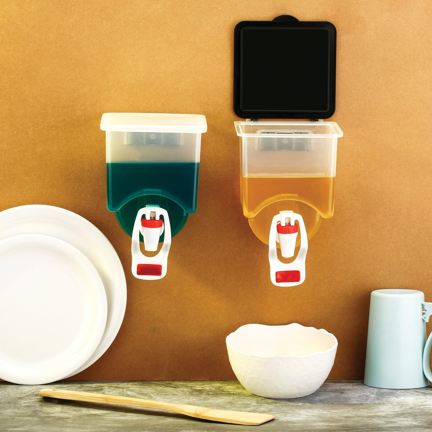 Front view of the 1100ml wall mounted oil dispenser showing its sleek design.