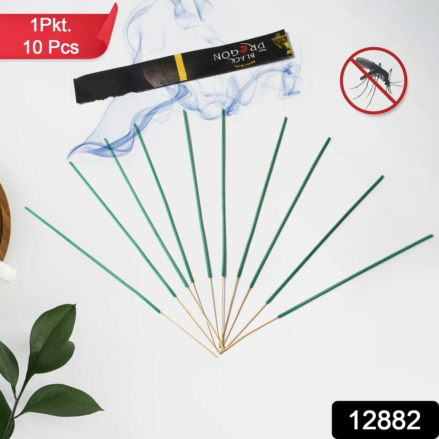Close-up of burning Herbal Mosquito Agarbatti stick with a wisp of low smoke.