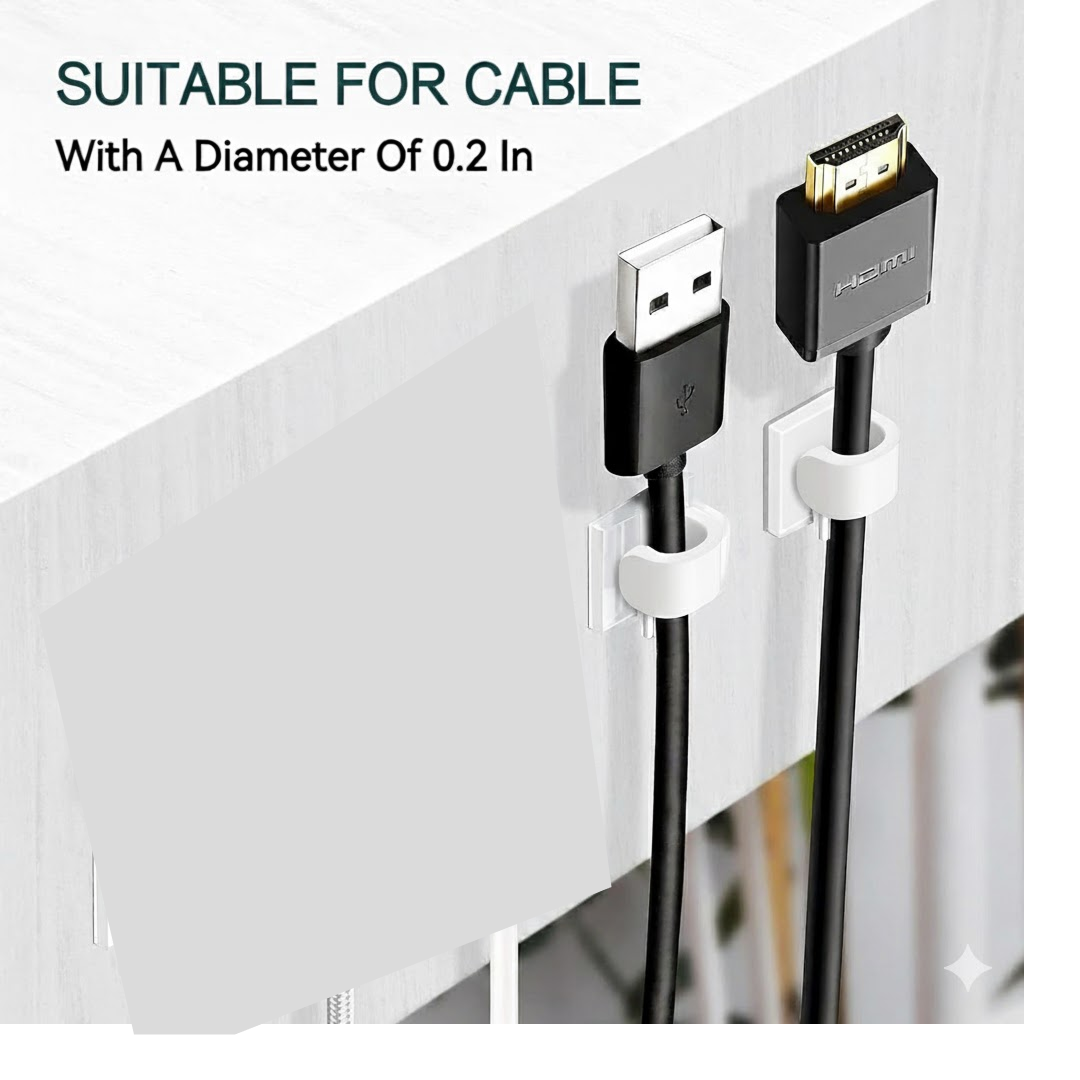 A black cable clip effectively holding multiple wires neatly against a desk edge.