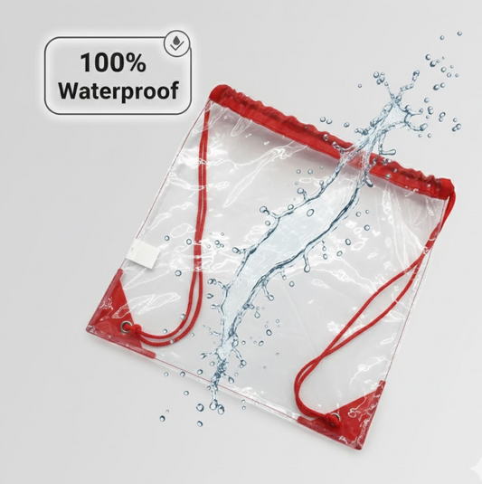 A clear drawstring bag with red trim is shown with a splash of water across it, highlighting its waterproof feature.